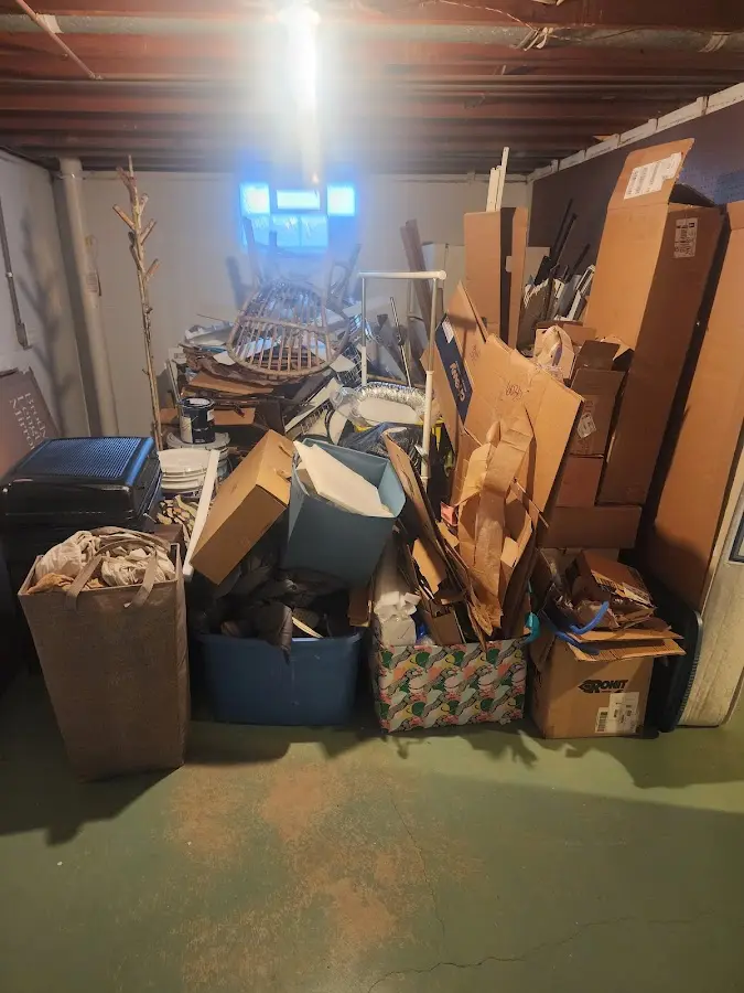 Roll-off dumpster container at job site for Construction Dumpster Rental in Trappe